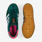 Adidas Originals Gazelle Indoor shoe in a Collegiate Green, white, and pink colorway